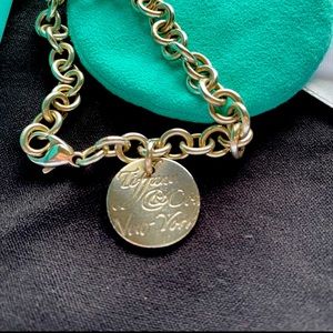 Tiffany & Co. charm bracelet.